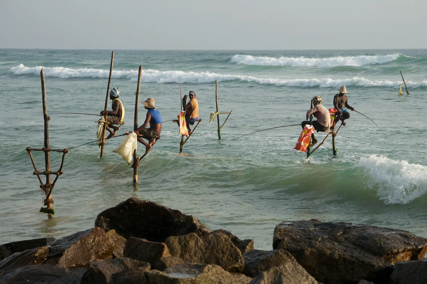 Sri Lanka traditional stilt fishermen for Pasikuda Relaxation Package