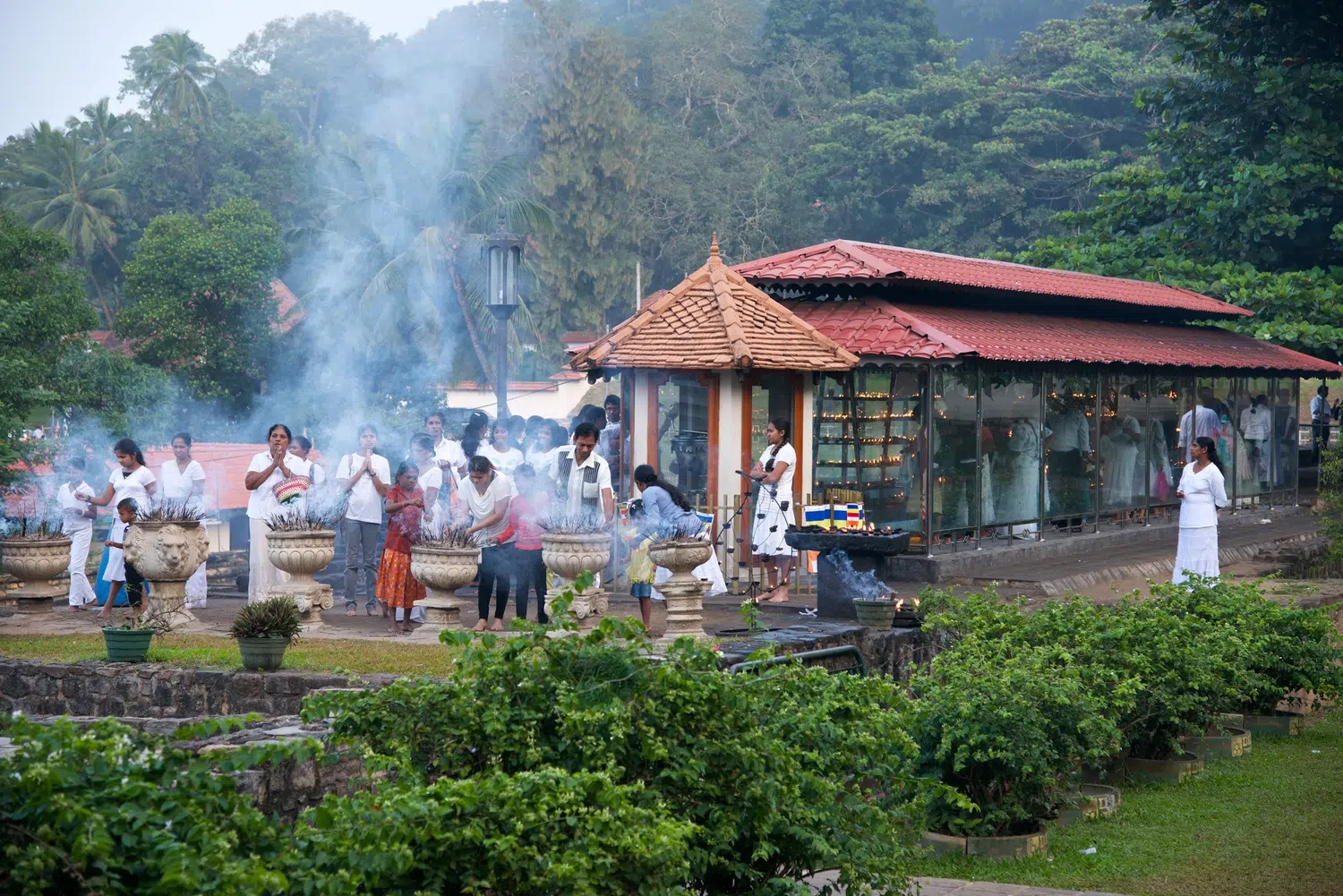 Temple of the Tooth, lake, offerings and sacred interiors for Sri Lanka private day tour with Trustker