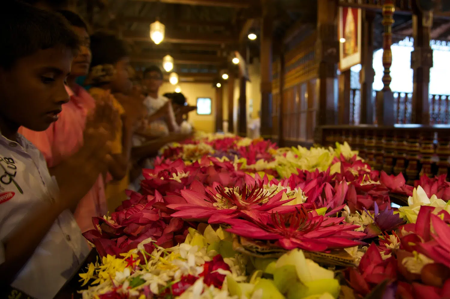 Temple of the Tooth, lake, offerings and sacred interiors for Sri Lanka private day tour with Trustker